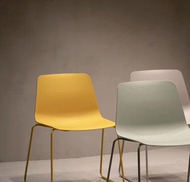 three chairs, yellow and beige